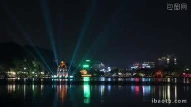 河内在夜间照亮龟塔和城市中心的还剑湖的时间间隔镜头